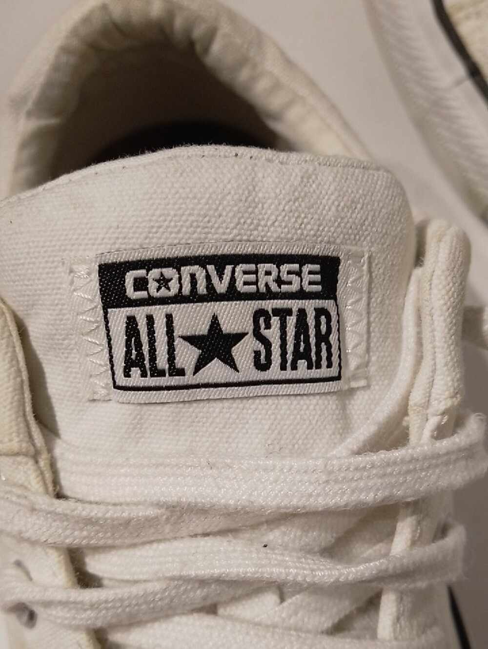 Converse White Low-Top Canvas Sneakers with Black Accents - Picture 5 of 7